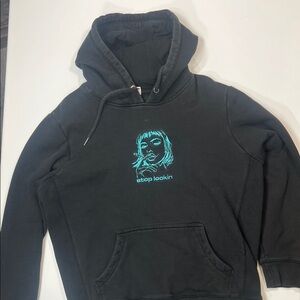 Stop Looking Black Hoodie with Teal Graphic Design